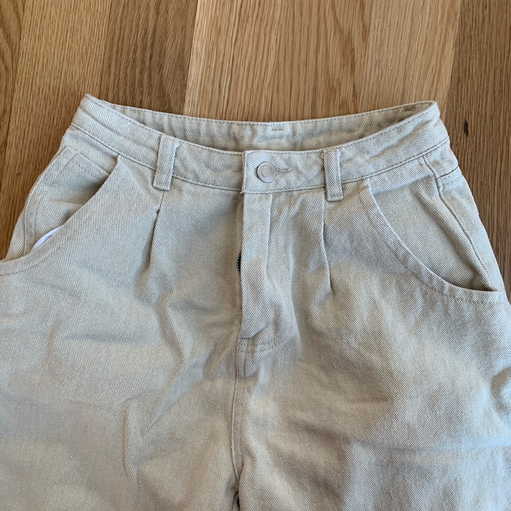 High waisted pleated cream pants